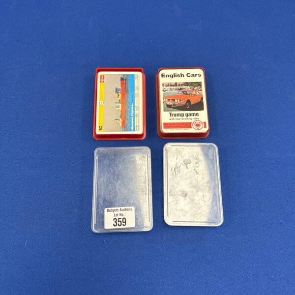 Vintage Top Trumps card sets featuring colourful car illustrations.