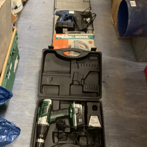 Vintage Black and Decker jigsaw in a tool lot, ideal for DIY projects.