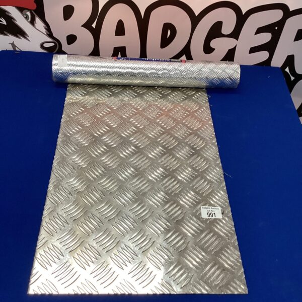 Small chequer plate sheet with diamond pattern and roll of Rifflefolie.