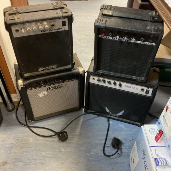 Vintage guitar amplifier lot with EG-10J model on display.