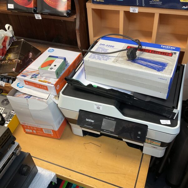 Brother MFC-J6720DW printer with included paper and toner cartridge.