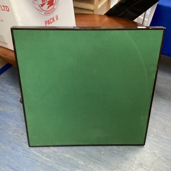 Vintage collapsible card table with laminate top.