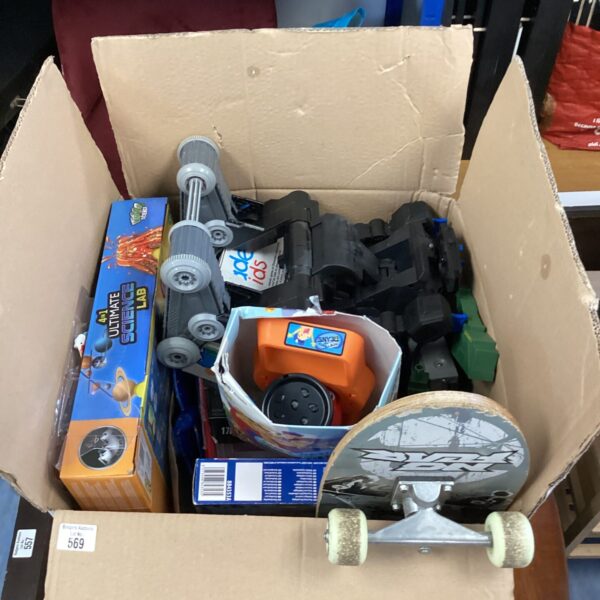 Kids toy bundle including Batman, science lab and skateboard.