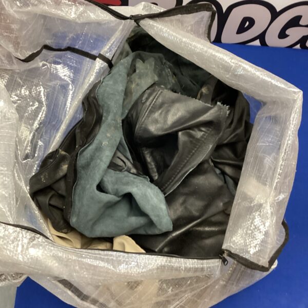 A bag of assorted leather offcuts for crafting projects.