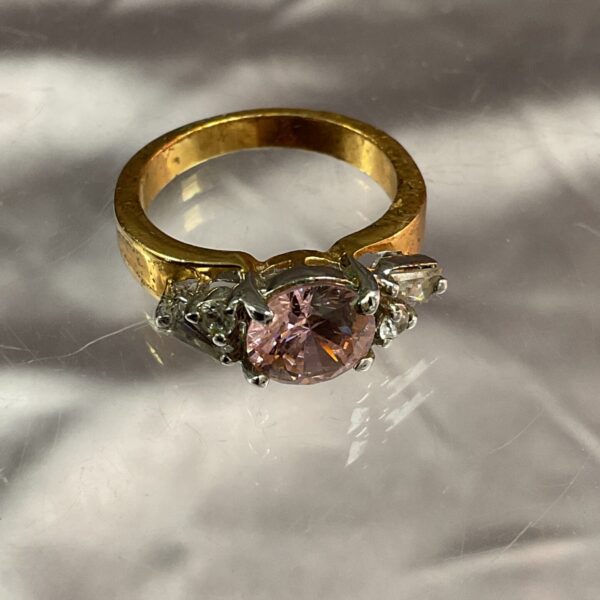 Vintage pink and white stone ring in yellow metal.