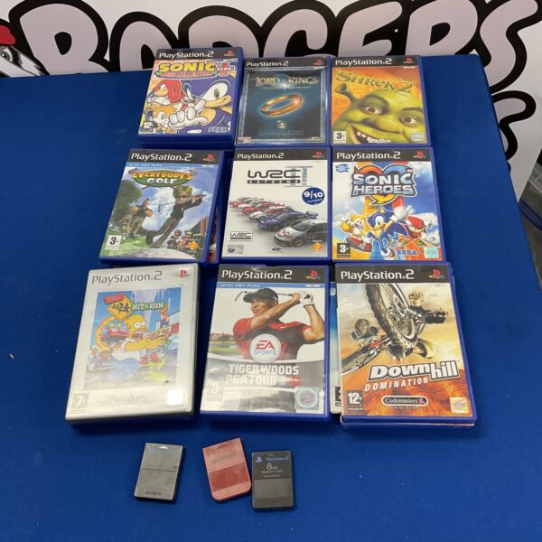 Playstation 2 games and memory cards lot for retro gaming collectors.