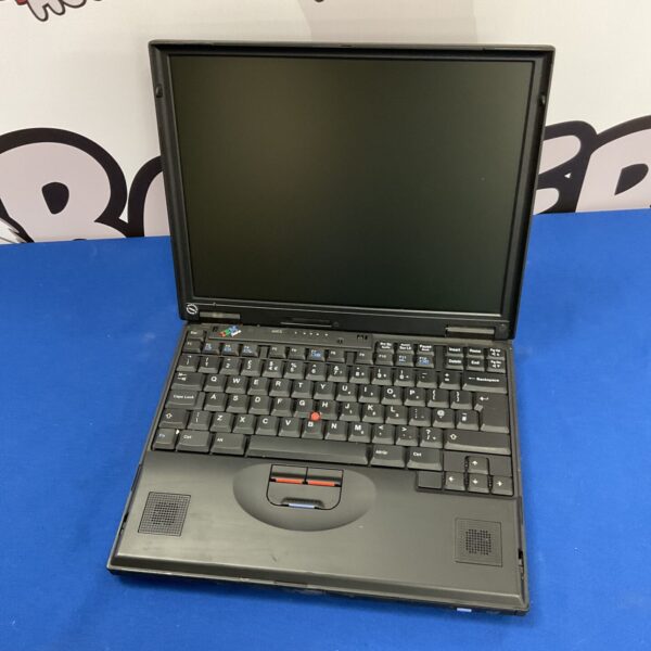 Vintage IBM Thinkpad 2645 laptop in black, side view.