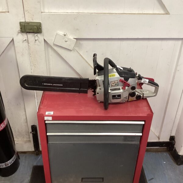 Used Spear and Jackson petrol chainsaw for garden tasks.