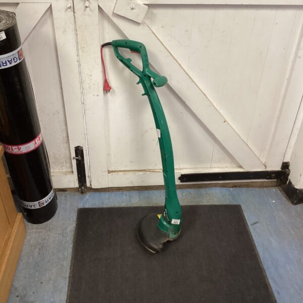 Used Qualcast electric strimmer for garden maintenance.