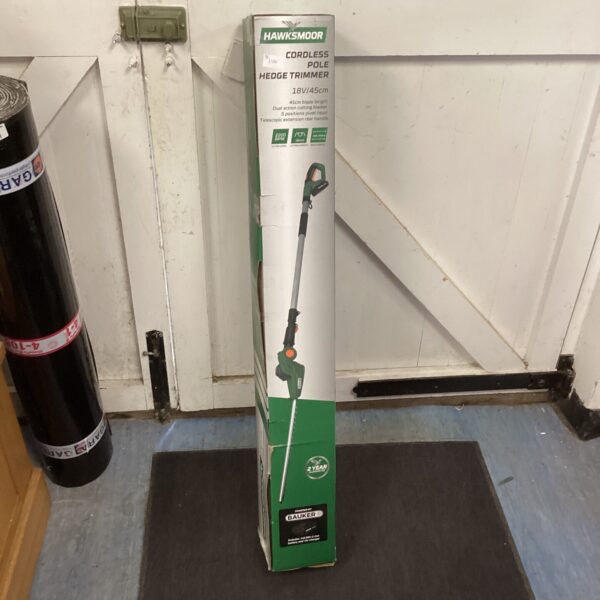 Hawksmoor cordless pole hedge trimmer in original packaging.