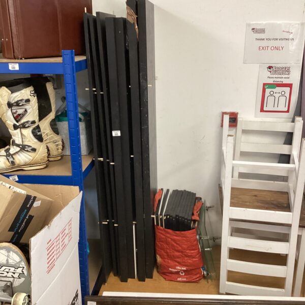 Ikea Kallax shelving unit with glass fronts for home storage.