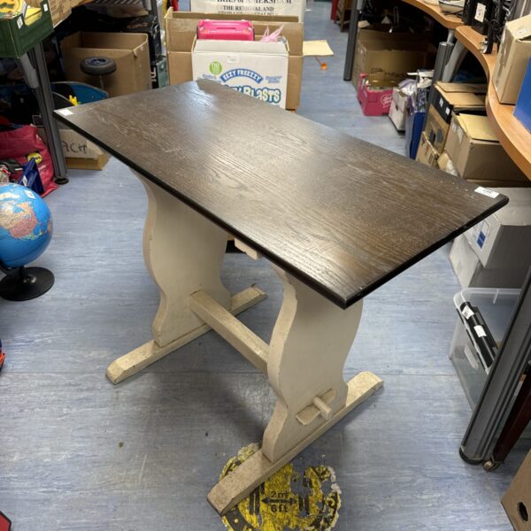 Vintage pub style kitchen table with weathered patina.