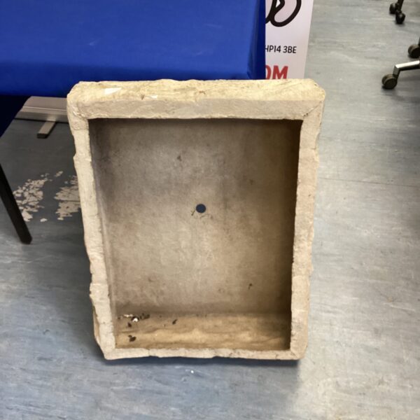 Weathered stone garden planter, ideal for outdoor plants and decor.