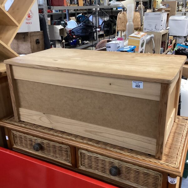 Vintage pine storage box with rustic charm.