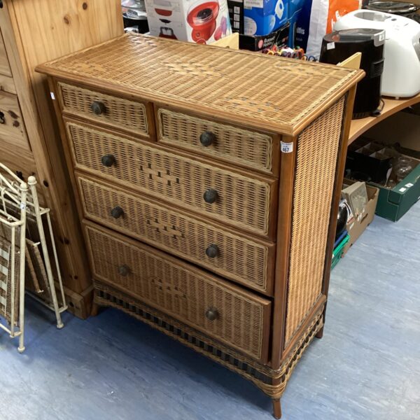 Vintage rattan chest of drawers with two over three drawers.
