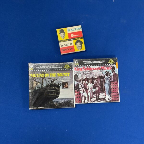 Vintage Super 8 film reels lot including Mutiny on the Bounty, Lauren and Hardy.