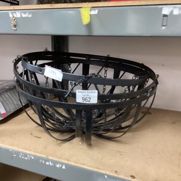 Vintage metal hanging basket frame for garden plants.