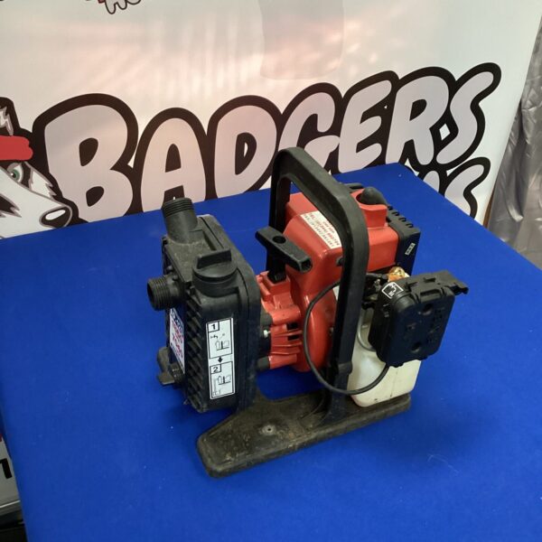 Used Homelite petrol water pump for garden irrigation.