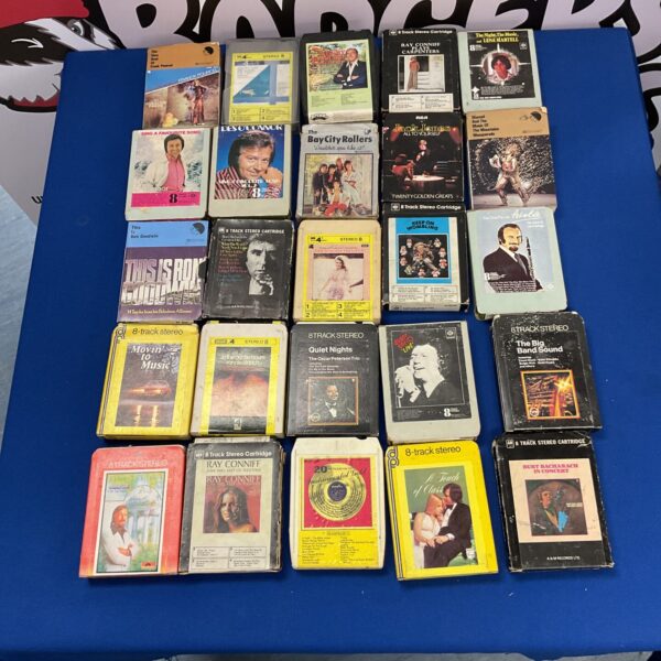 Vintage 8-track music collection featuring artists like The Carpenters.