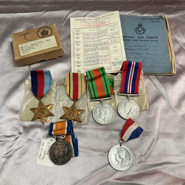 Vintage WWII and WWI medal collection with RAF Release Book.