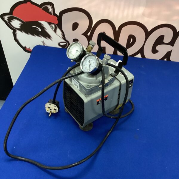 Front view of a Gast pressure pump with regulator.