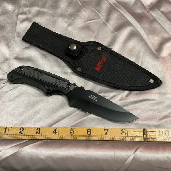 Black M Tech USA sheath knife with nylon sheath.