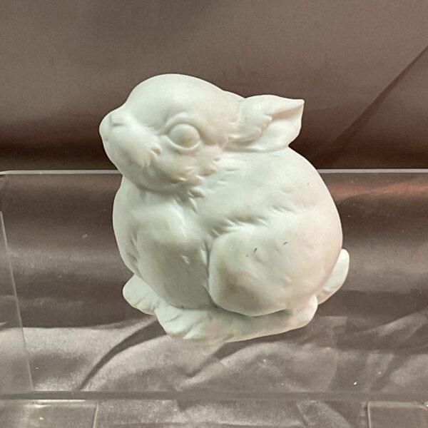 Vintage Kaiser German porcelain rabbit figurine, detailed and charming.