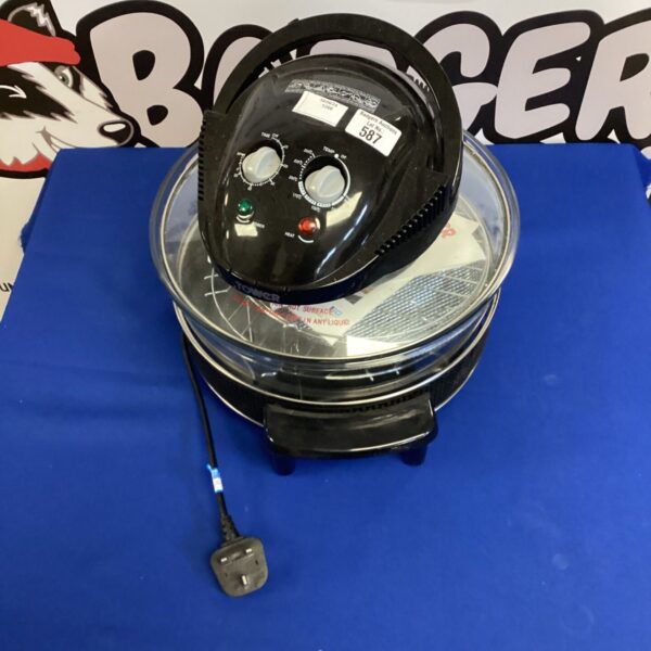 Front view of a Tower halogen cooker with glass bowl and controls.