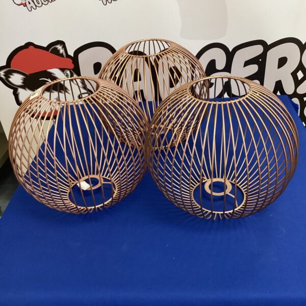 Lot of three rose gold lamp shades for modern lighting.