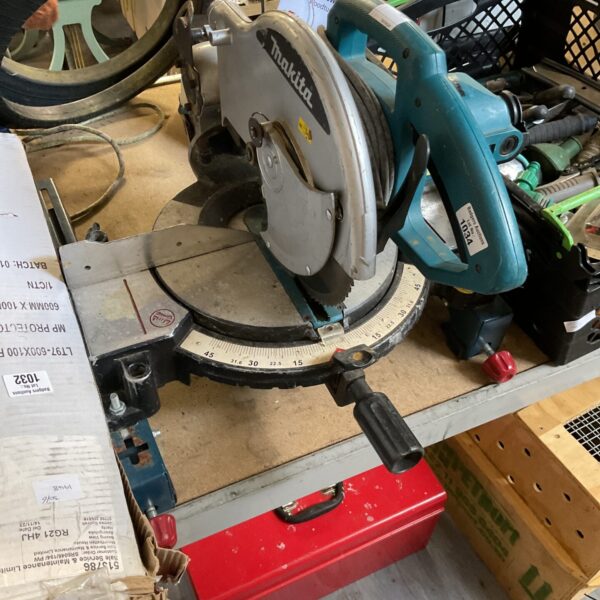Used Makita MLS100 mitre saw for woodworking projects.