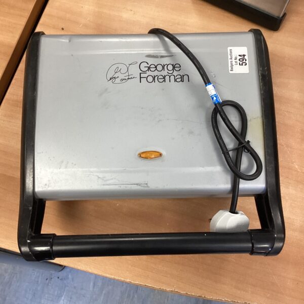 Used George Foreman grill, kitchen appliance for healthy cooking.