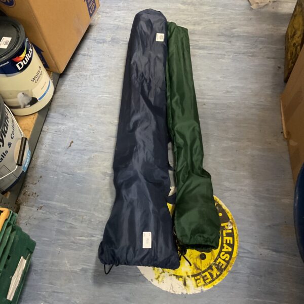 Navy blue camping chair carry bag with drawstring closure.