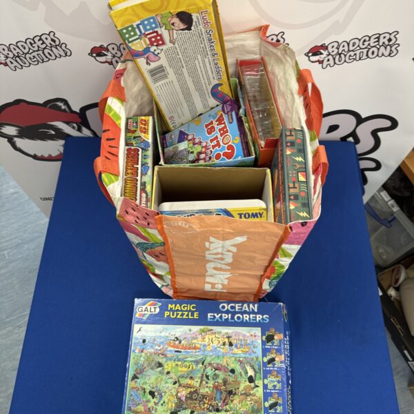 Colourful board game and puzzle lot for family entertainment.