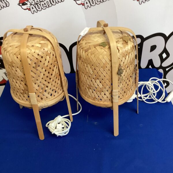Pair of Ikea bamboo table lamps with woven shades.