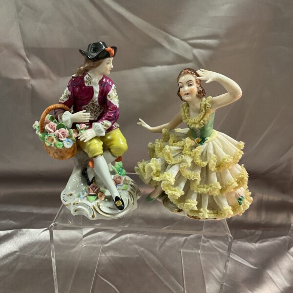 Antique Dresden porcelain figures of a ballerina and flower seller.