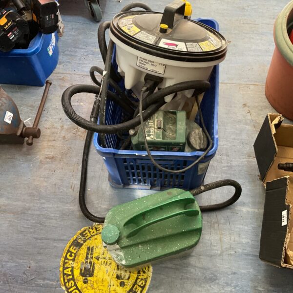 Wallpaper steamers and fence sprayer lot for DIY projects.
