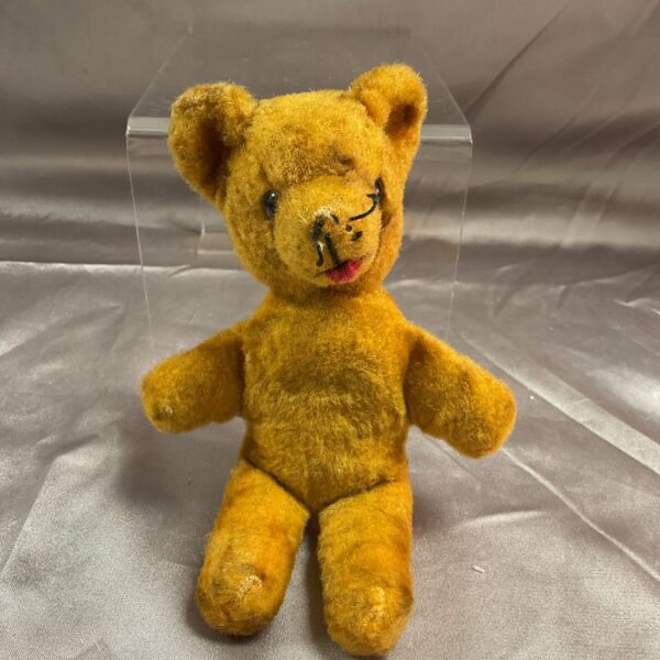 Antique 6” teddy bear with golden mohair fur.