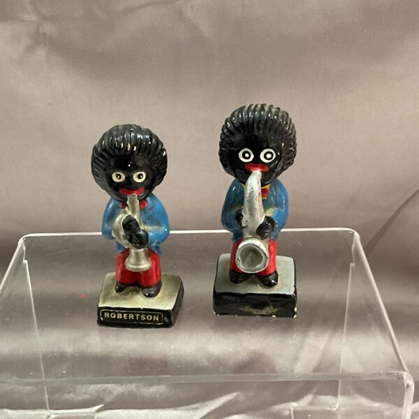 Vintage Robertson Golly band figure playing saxophone.