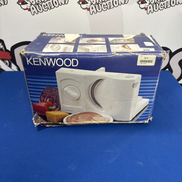Kenwood meat slicer in original box, vintage kitchen appliance.