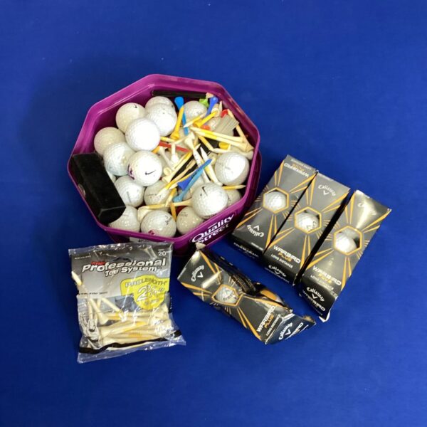 Golf balls and tees lot including Callaway equipment for practice.