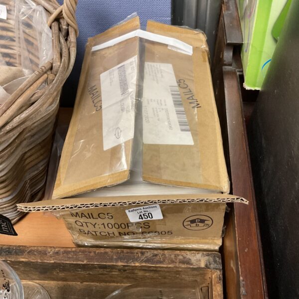 Two boxes of unopened self seal plastic pouches for mailing.
