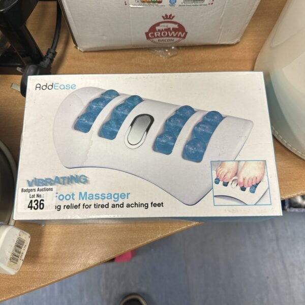Vintage Addease foot massager for soothing foot therapy.