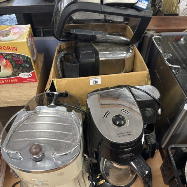 Vintage stainless steel coffee percolator for brewing coffee.