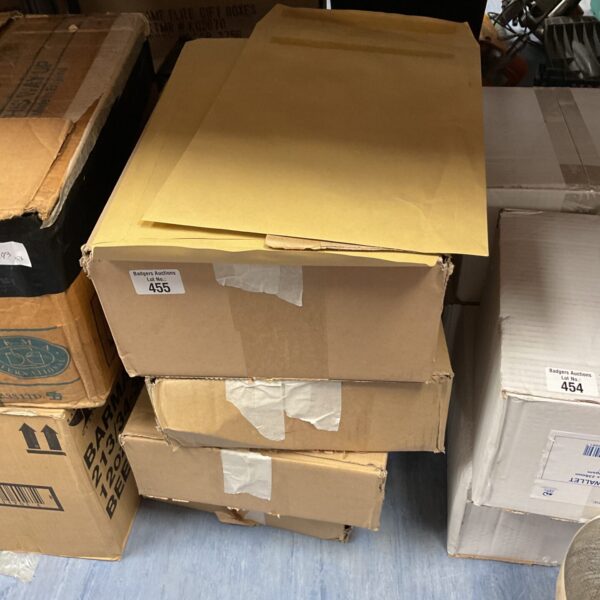 Stack of four boxes containing brown A4 envelopes.
