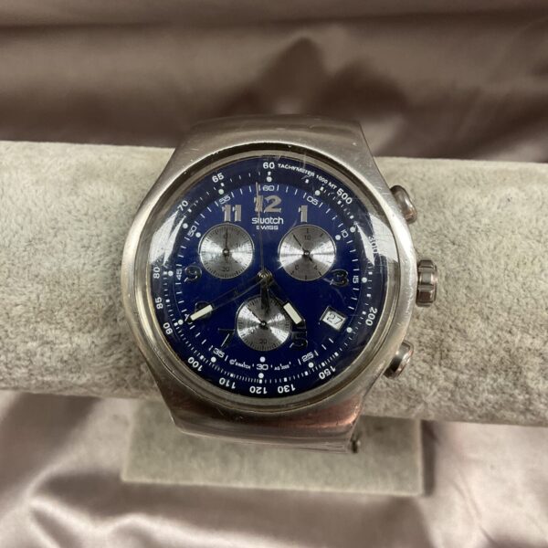 Front view of a vintage Swatch quartz wristwatch.