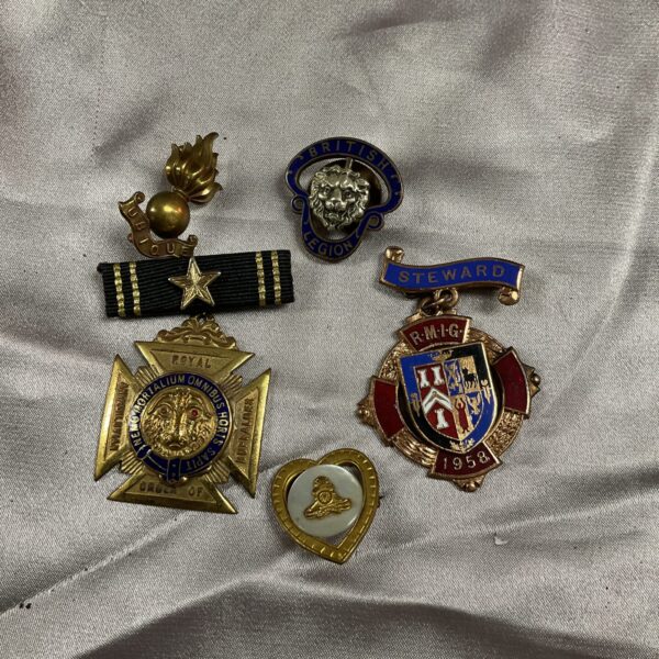 Antique lot of masonic and military badges and medallions.