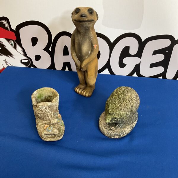 Detailed meerkat garden ornament with stone effect finish.
