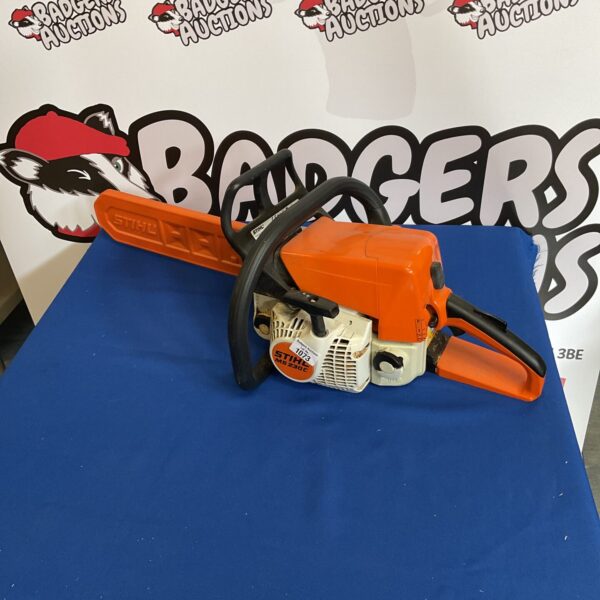 Vintage Stihl petrol chainsaw for auction, garden and landscaping tool.