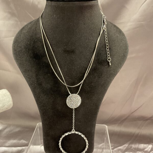 Elegant silver zircon pendant necklace, sparkling fashion jewellery.