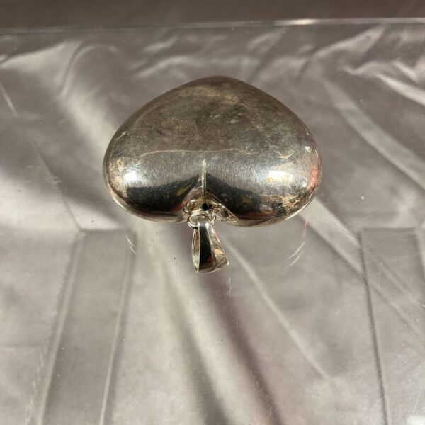 Vintage silver puffed heart pendant with hallmarking.